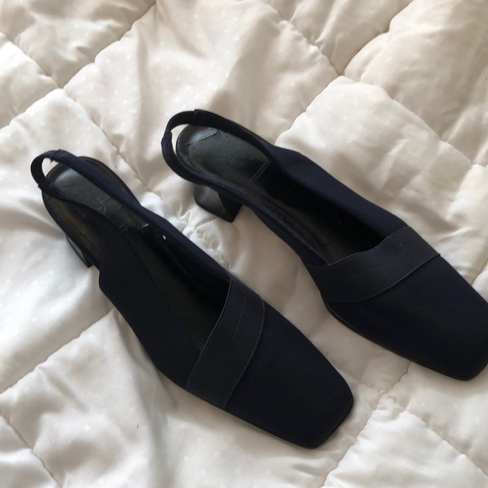 Navy blue sling back purchased to wear to wedding.  Worn only one time.